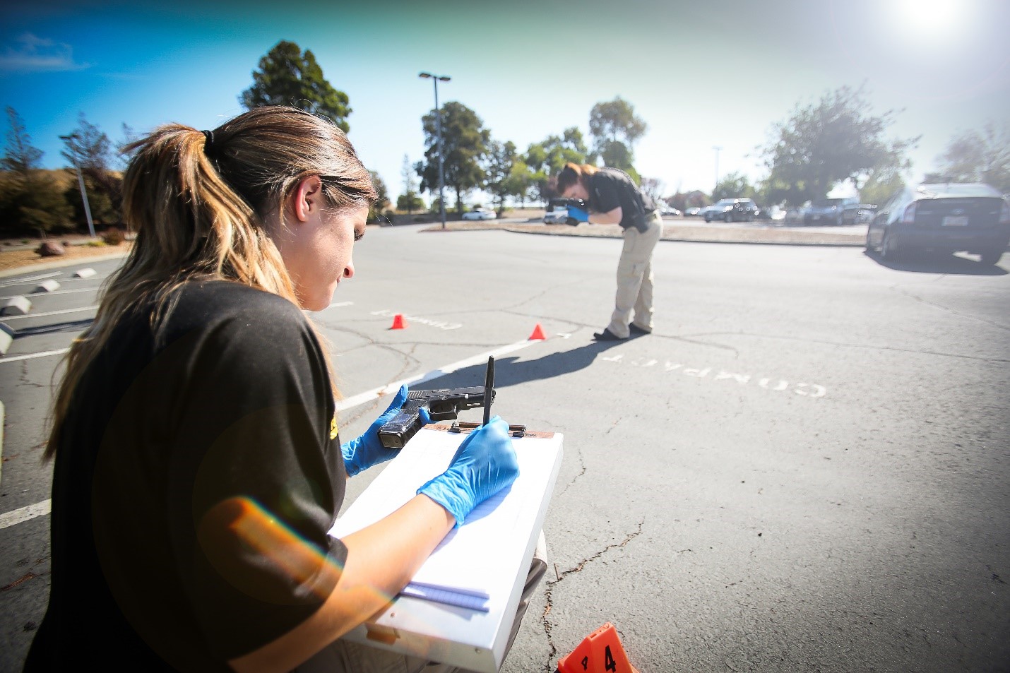 Photo of Crime Scene Responder Filling out Paperwork