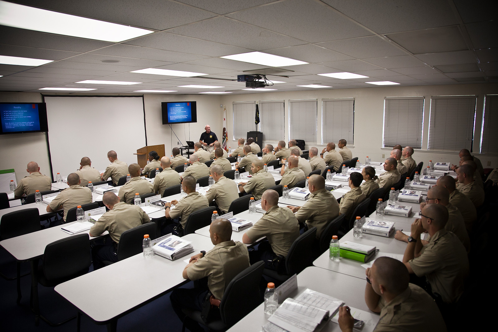 Photo of Long Tables full of Officers