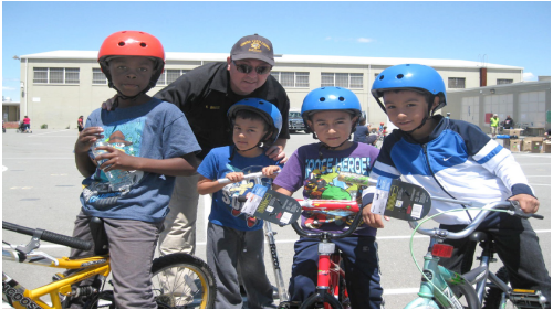 Photo of Officer interacting with Civilians