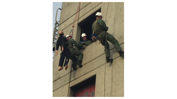 SWAT Officers Scaling a Building