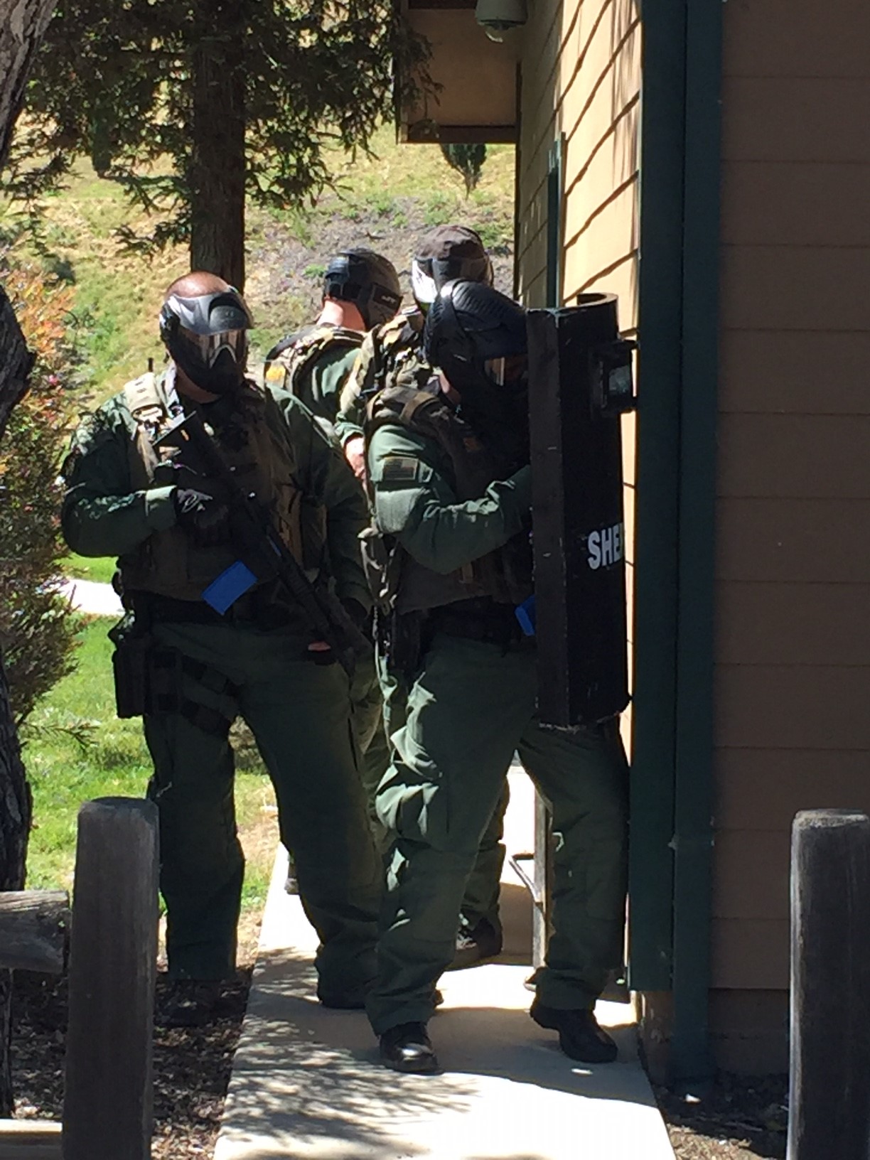 SWAT Officers Storming a Building