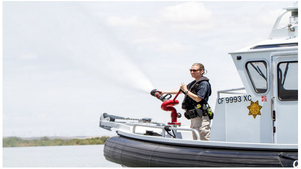 Photo of Marine Patrol Boat and Officer