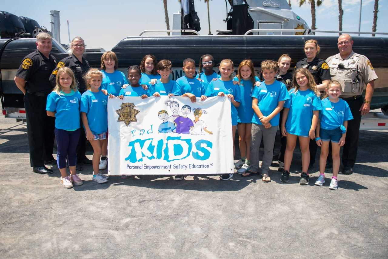 Photo of RadKids w/ Sign